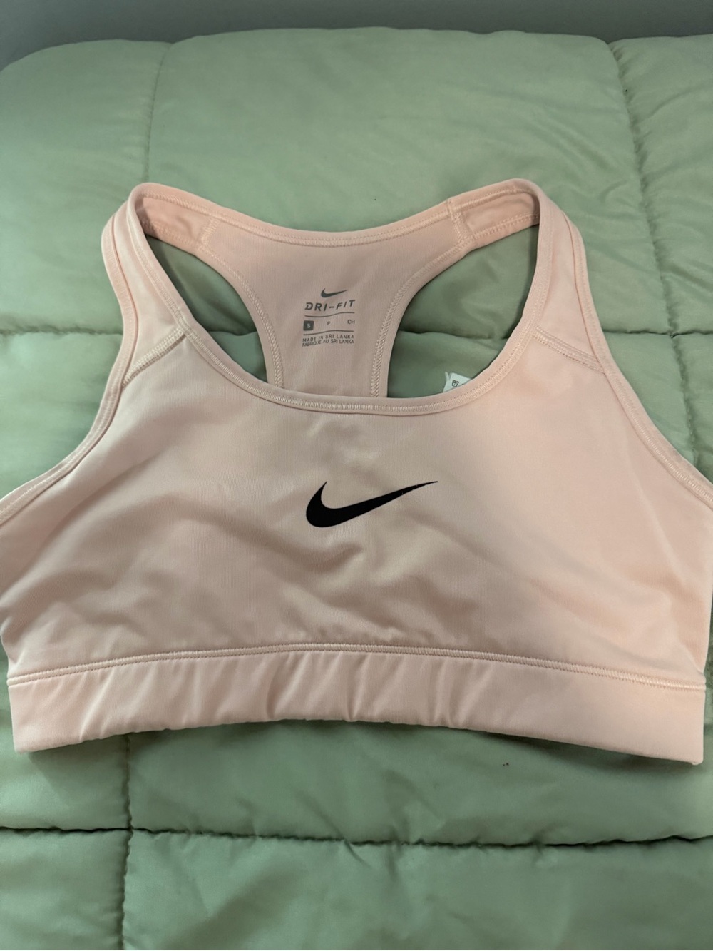 Nike Light Pink Racerback Sports Bra with Black Swoosh